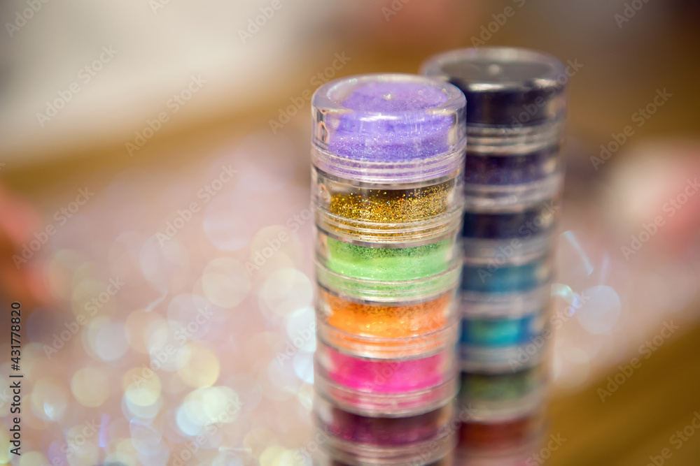 multiple boxes of glitter makeup artist face multiple boxes of glitter makeup artist face