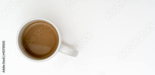 Top view, flat lay of black coffee cup on background white.