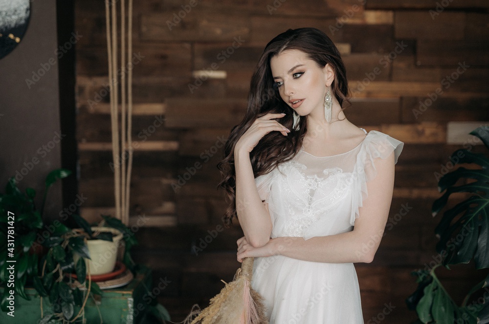 Naklejka premium Beautiful girl in a light dress. Boho style.