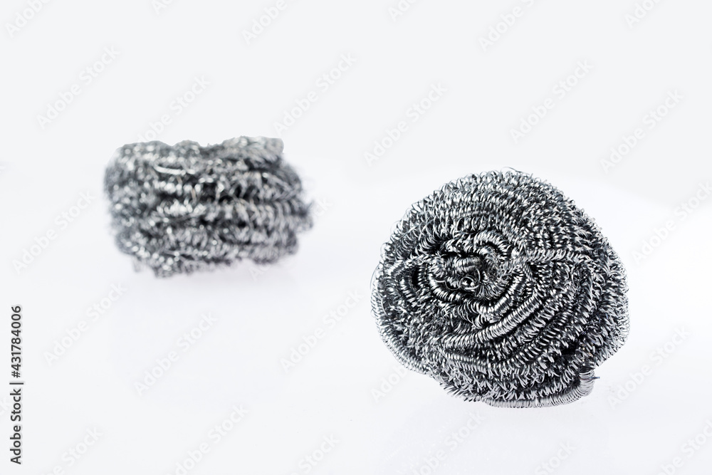 Metal kitchen sponge on white background - Text space Metal kitchen sponge on white background - Text space