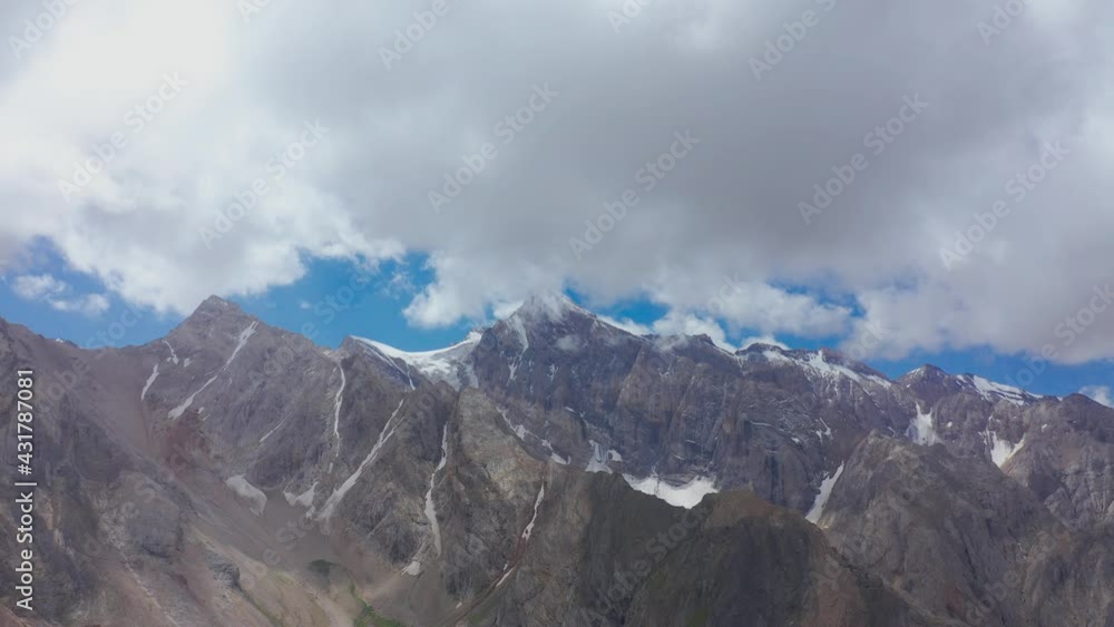 Mountain peak with cloudy sky in Italy, Dolomites. Aerial timelapse 4K. Mountain peak with cloudy sky in Italy, Dolomites. Aerial timelapse 4K.
