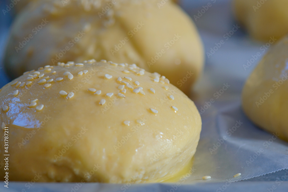 Home baking artisan brioche burger buns. Cooking bread. Home baking artisan brioche burger buns. Cooking bread.