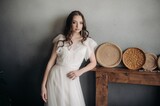 A beautiful bride in a light dress. Boho style.