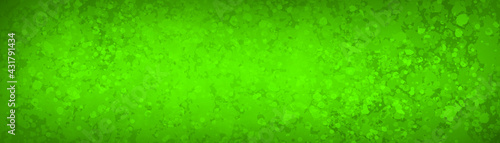 green background with abstract texture pattern of paint spatter in green Christmas bokeh design