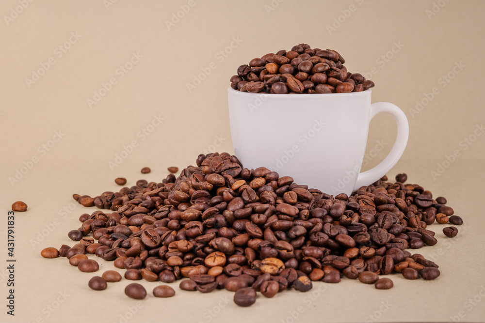 Coffee beans in a cup. Coffee beans in a cup.