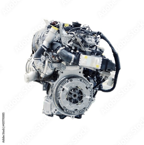 A modern car engine isolated on a white background. Conceptual shot of a new car engine. Automotive industry concept. © Hamik