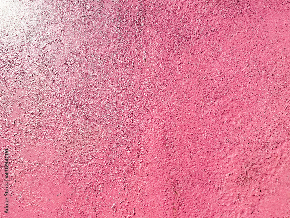 Fototapeta premium Red pinkish texture of a metallic iron old wall painted with cracks and abrasions. The background. Texture