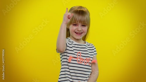 Inspired playful blonde kid child 5-6 years old make gesture raises finger came up with creative plan feels excited with good idea, inspiration motivation on yellow background. Children girl emotions