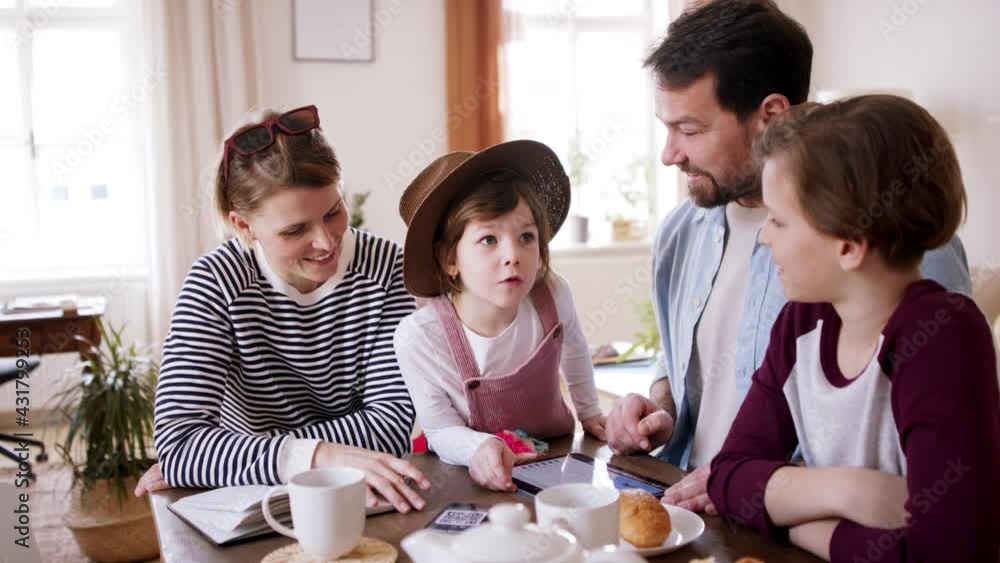 Beautiful family having breakfast before departing for vacation. Beautiful family having breakfast before departing for vacation.