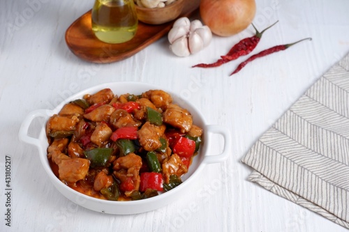 Fototapeta Naklejka Na Ścianę i Meble -  Kung Pao chicken, stir-fried traditional Chinese sichuan  dish,with chicken, peanuts, vegetables and chili peppers.