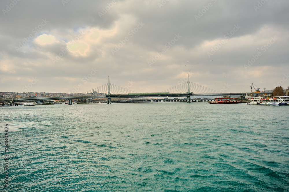 istanbul. Turkey 26.02.21. photo taken by galata bridge in karakoy shore during overcast weather in golden horn istanbul.