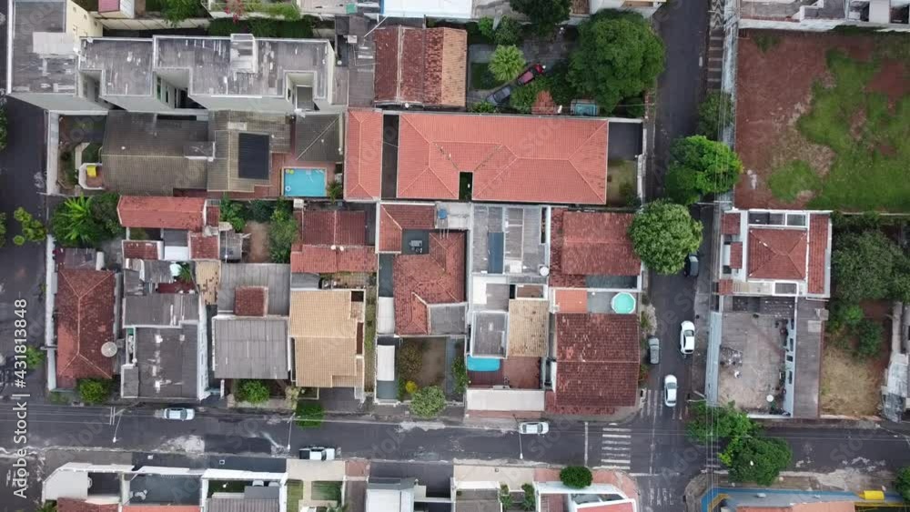 slowly descend top down view city suburbs Brazil