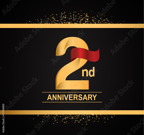 2 years anniversary logotype with premium gold color and red ribbon with glitter background isolated on black background. can be use for celebration and party