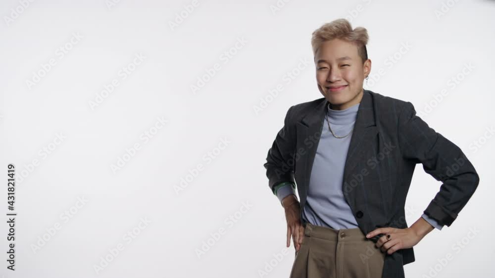 Warm welcoming Asian person motioning toward viewer on white Warm welcoming Asian person motioning toward viewer on white
