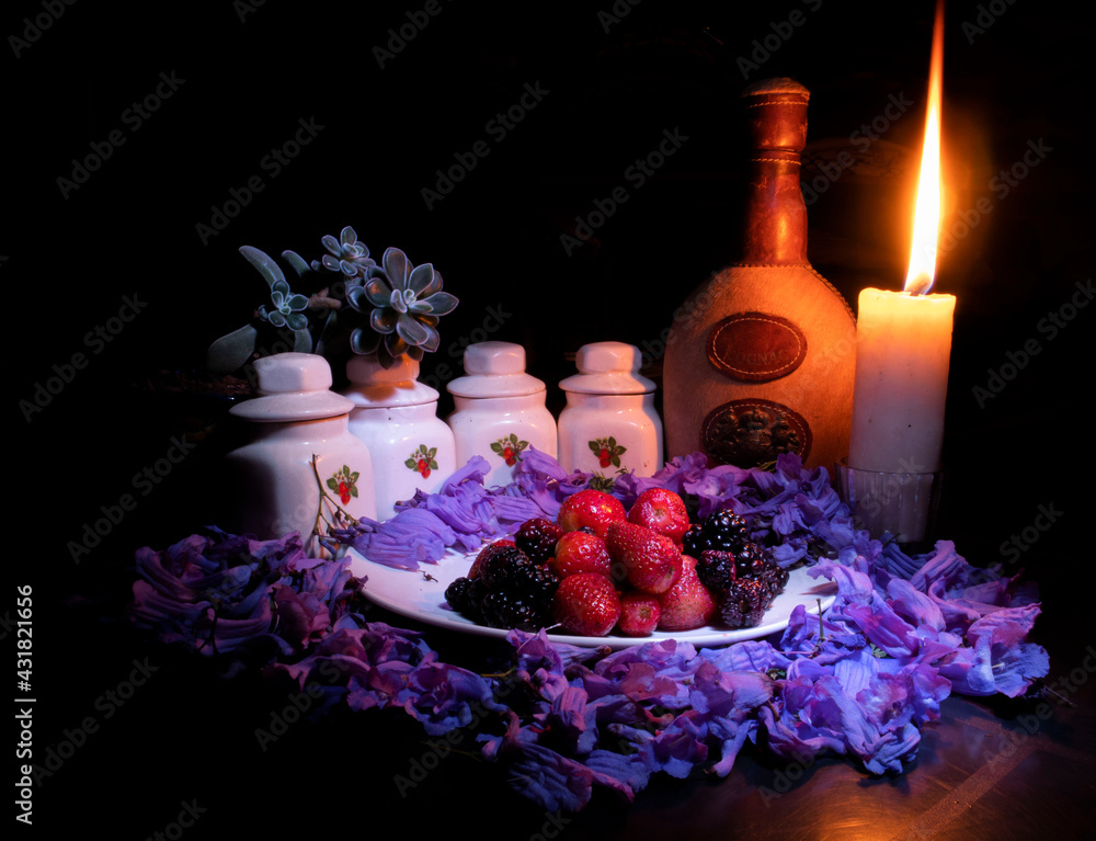 Still Life with flowers, berries, cognac and candle / Bodegón con