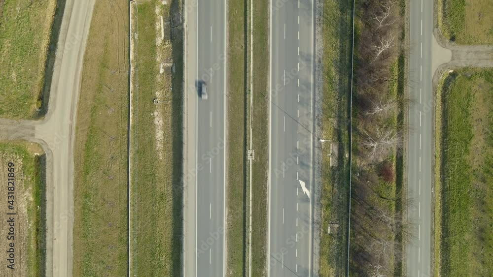 Aerial shot of top down expressway outside the city in Poland road s7 Aerial shot of top down expressway outside the city in Poland road s7