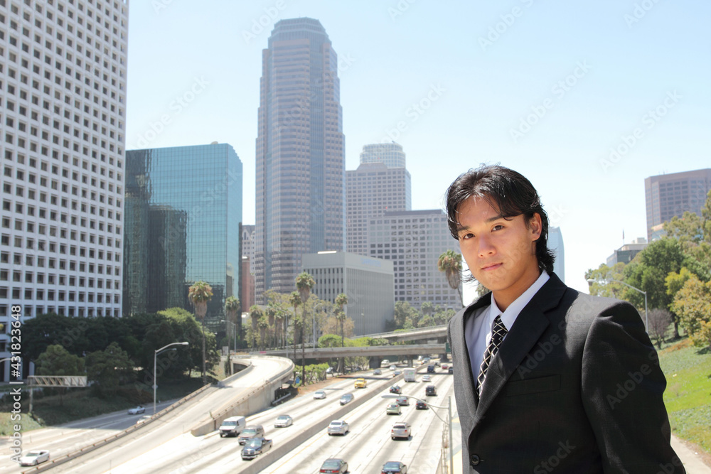 Young Japanese businessman walking in the american business district
Young Japanese businessman walking in the american business district