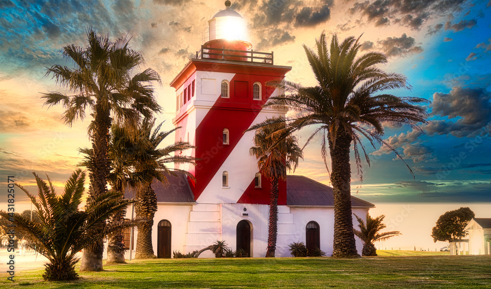Fototapeta premium Alluring Sunset over Muille Point lighthouse, Sea Point, Cape Town, South Africa
