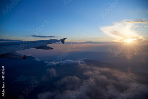 Aerial view from the window of an avianca plane of the Andean mountain ranges in Colombia. 
