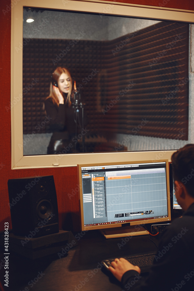 Singing and working in a studio with a microphone Singing and working in a studio with a microphone