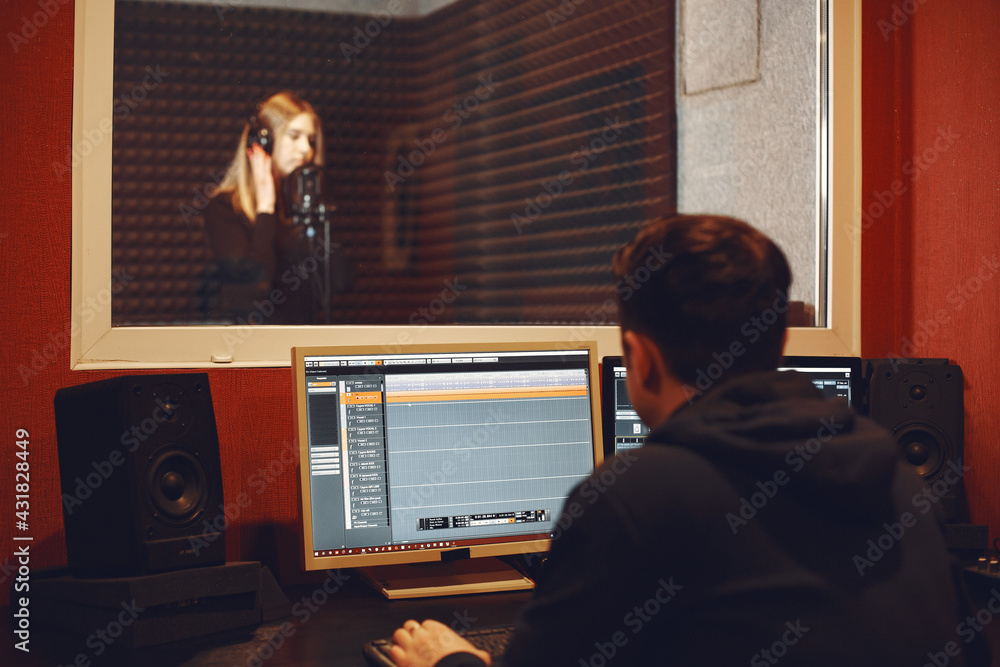 Singing and working in a studio with a microphone Singing and working in a studio with a microphone