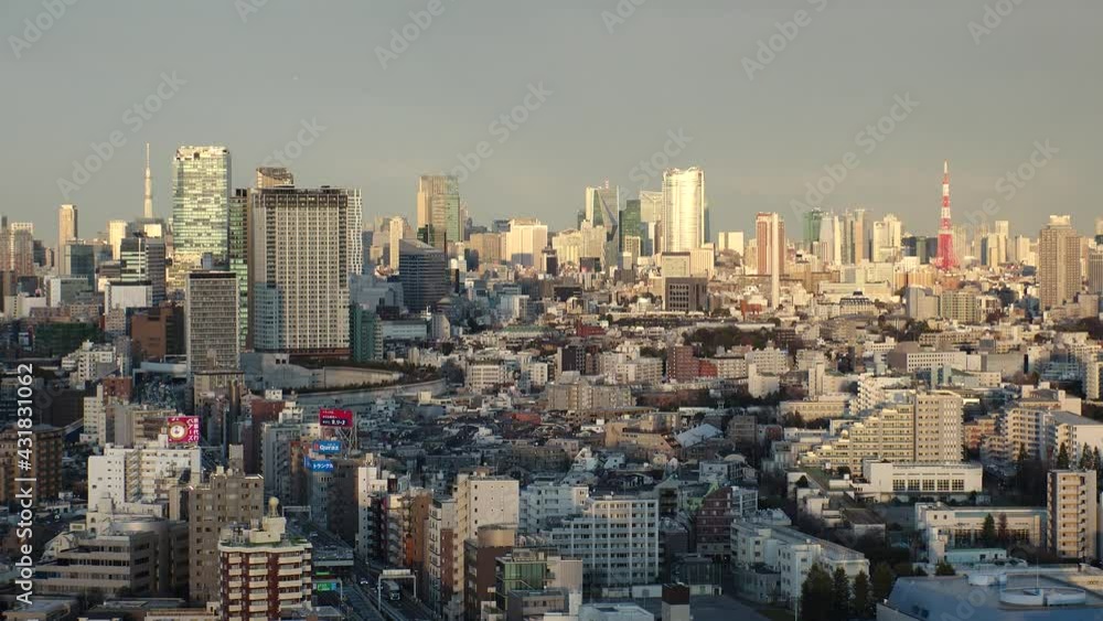TOKYO, JAPAN : Aerial high angle sunset or sunrise CITYSCAPE of TOKYO. View of buildings at central downtown area. Japanese urban city life and metropolis concept. Real time shot. TOKYO, JAPAN : Aerial high angle sunset or sunrise CITYSCAPE of TOKYO. View of buildings at central downtown area. Japanese urban city life and metropolis concept. Real time shot.