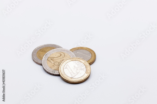 four euro coins on a white background