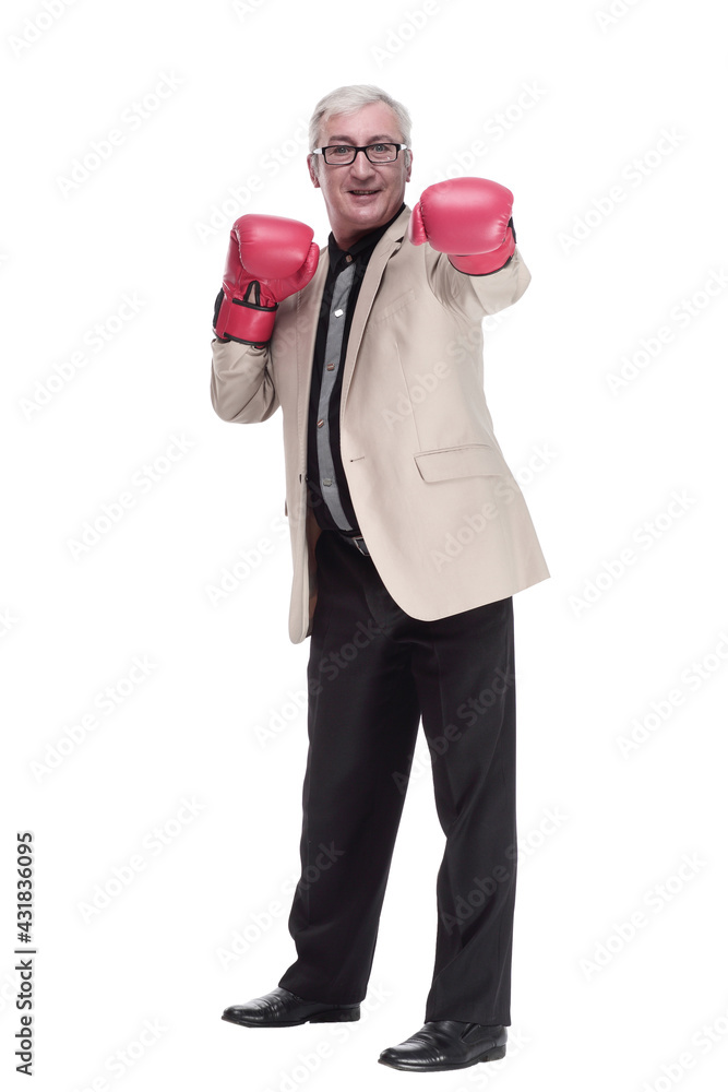 in full growth. Mature, intelligent man in Boxing gloves. in full growth. Mature, intelligent man in Boxing gloves.