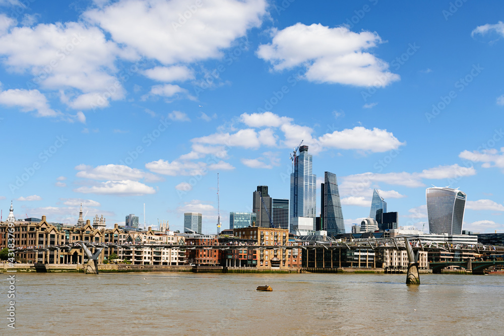 London Embankment and Millenium bridge across the river Thames.