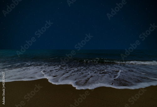 Fototapeta Naklejka Na Ścianę i Meble -  Stars on a beach in Tuscany, Italy at night