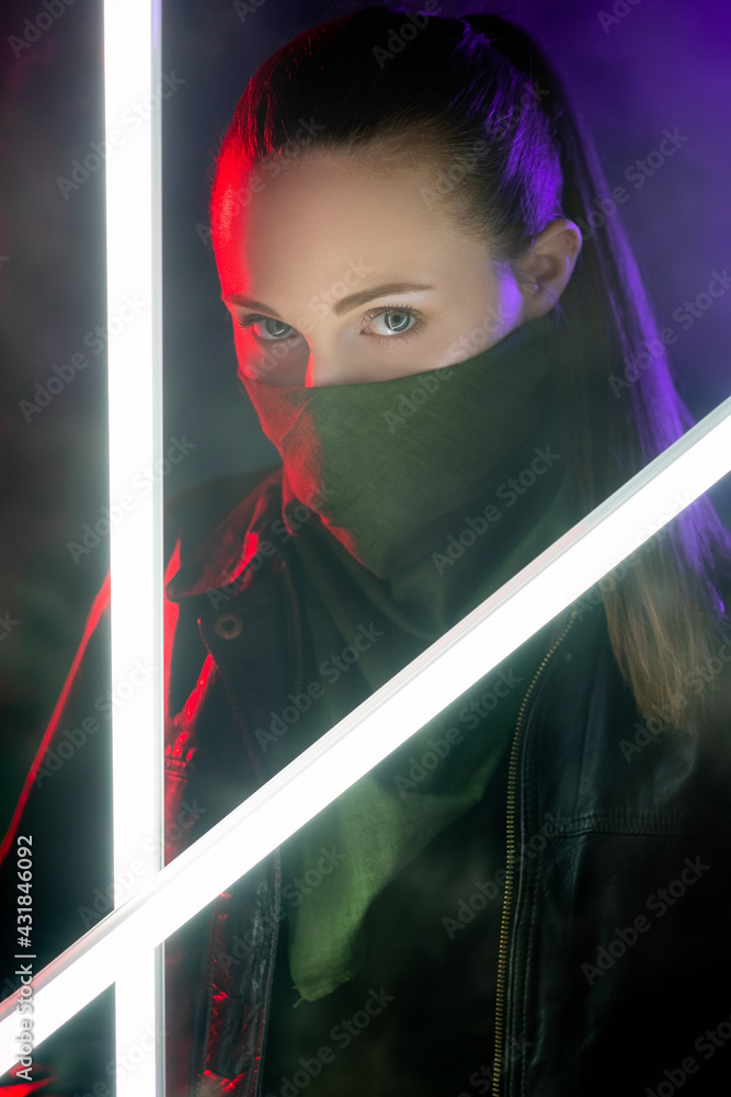 Premium Photo  Cyberpunk woman futuristic portrait urban fashion  mysterious girl in face bandana buff mask black leather jacket in red  purple neon light color steam white led glow at dark night