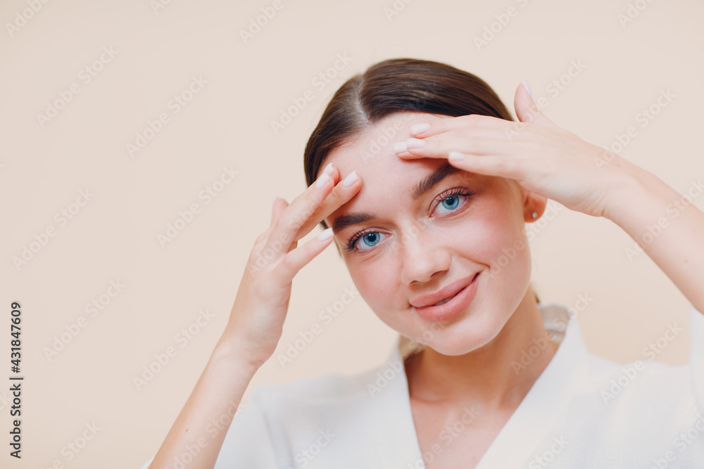 Young caucasian woman doing facebuilding yoga facial gymnastics self lymph facelift massage. Young caucasian woman doing facebuilding yoga facial gymnastics self lymph facelift massage.