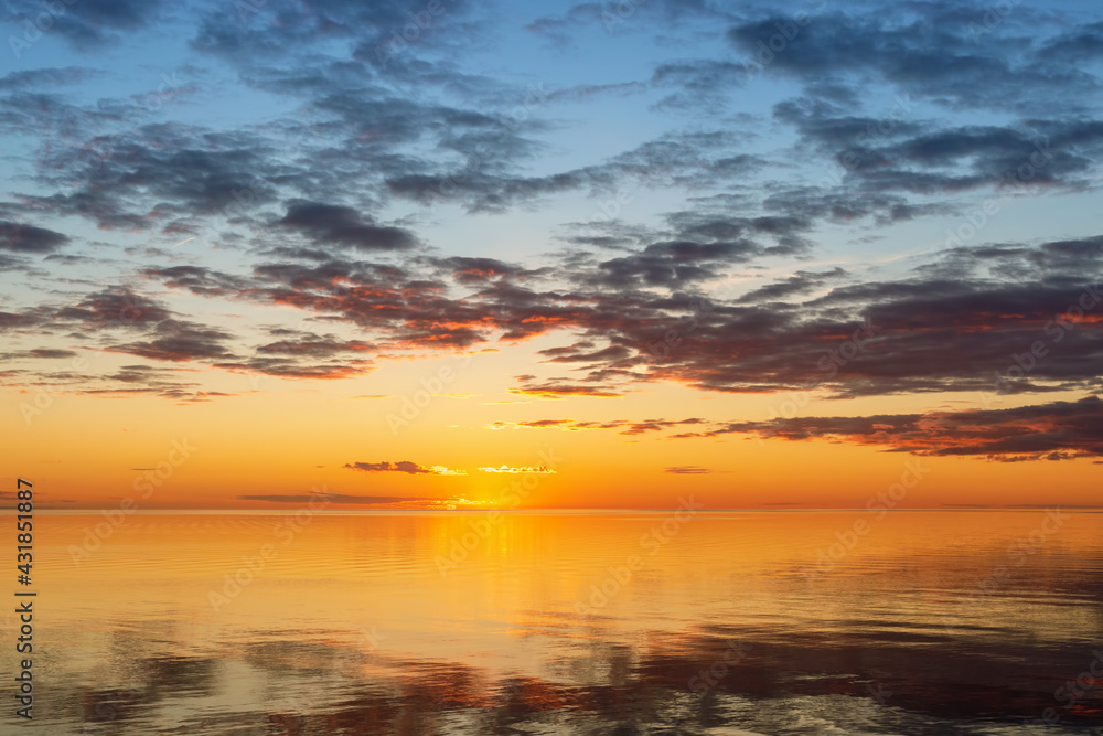 Sunset on Beloye lake on quiet summer evening. Belozersk, Vologda Oblast, Russia.
