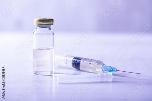 Vaccine in bottle with syringe. Vaccination concept.