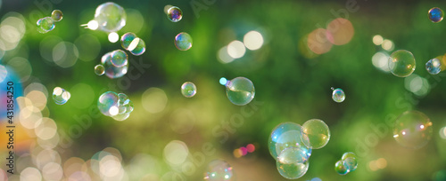 soap bubbles on a colorful blurry background