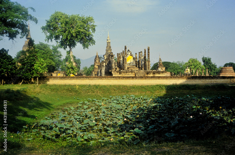 old stone temple with buddha in Thailand in the park