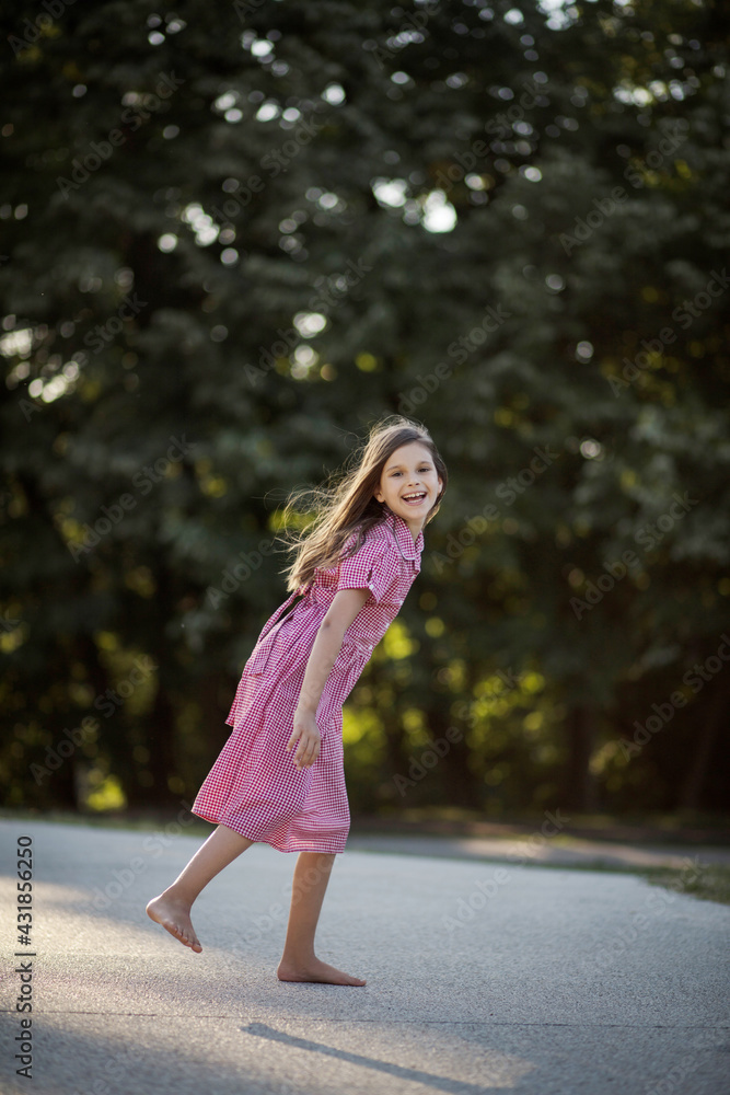 Cheerful and happy. Happy little girl running trough nature. Cheerful and happy. Happy little girl running trough nature.