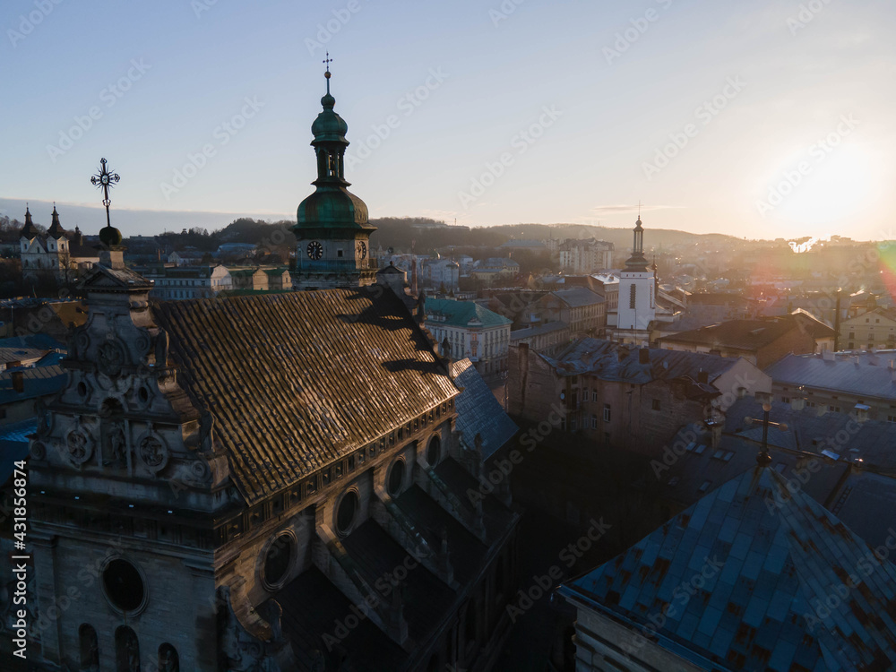 Low key aerial view on Bernardine church during the sunrise in Lviv.