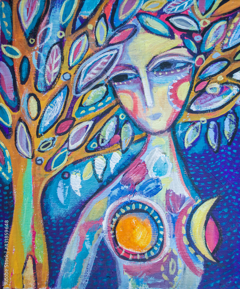 Fototapeta premium Woman witch in the crown of a mystical tree on a night background.