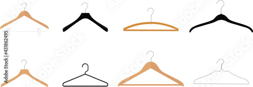 Wooden, plastic and metal wire coat hangers, clothes hanger on a white background photo