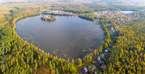 Aerial view of Vvedenskoye lake on sunny autumn day. Vladimir Oblast, Russia. photo