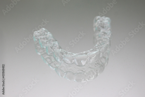 Align your teeth with clear aligner. Clear retainer