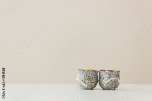 A ceramic cups on table. © aradaphotography