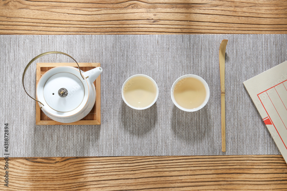 green tea and tea set on the table green tea and tea set on the table