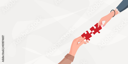 Match.Challenge.Arms of hands of people or colleagues of diverse culture holding jigsaw puzzle pieces that connect.Problem solving.Teamwork.Strategy. Missing link. Banner.Copy space
