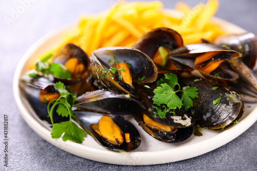plate with mussel and french fries