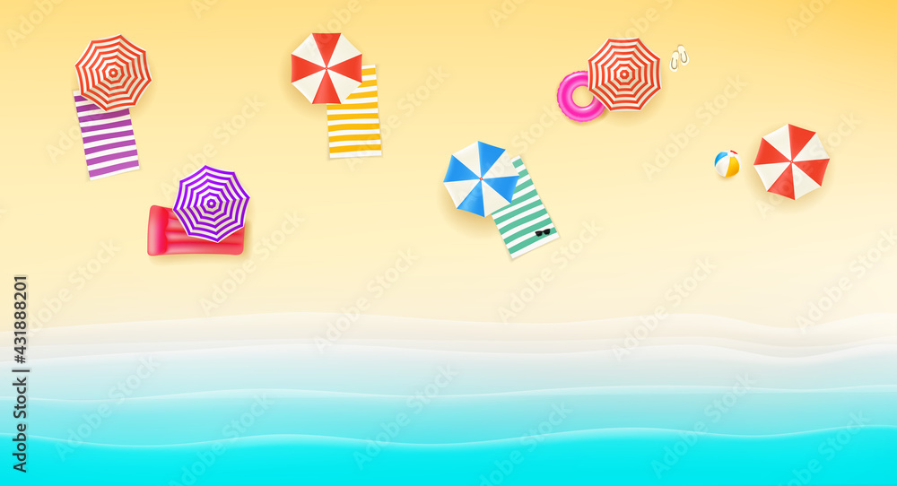 Bright sunny beach with color umbrellas and towels. Top view
