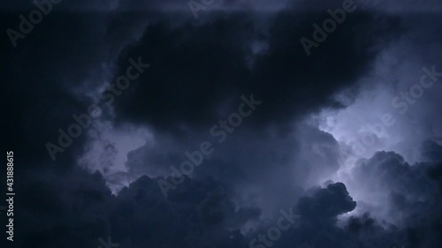 Lightning fiercely on a thunderstorm dusk photo