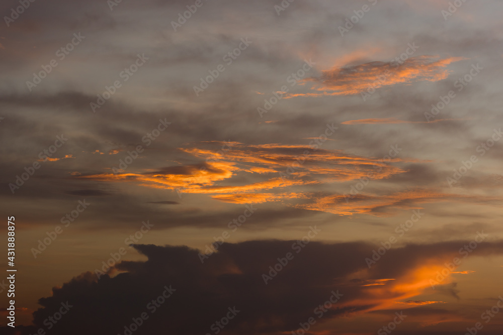 Real majestic sunrise sundown sky background with gentle colorful clouds