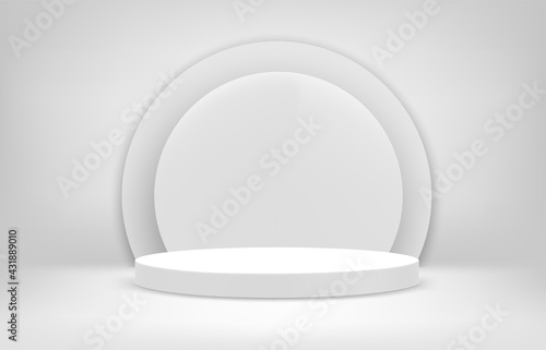 Bright white interior scene with round pedestal